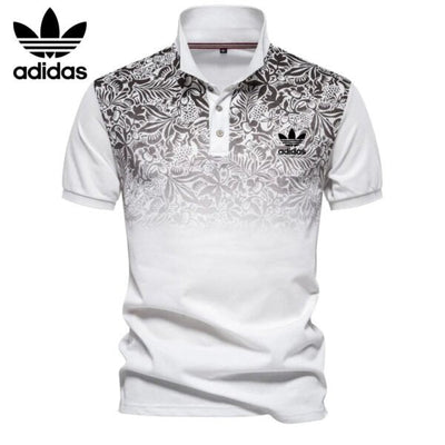 AD – Polo con motivo floreale sfumato