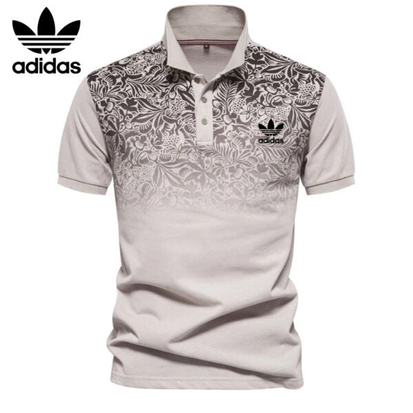 AD – Polo con motivo floreale sfumato