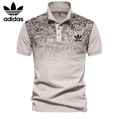 AD – Polo con motivo floreale sfumato
