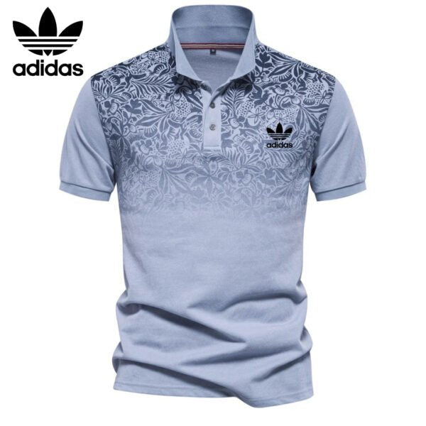 AD – Polo con motivo floreale sfumato